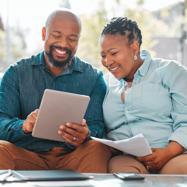 A couple using a tablet