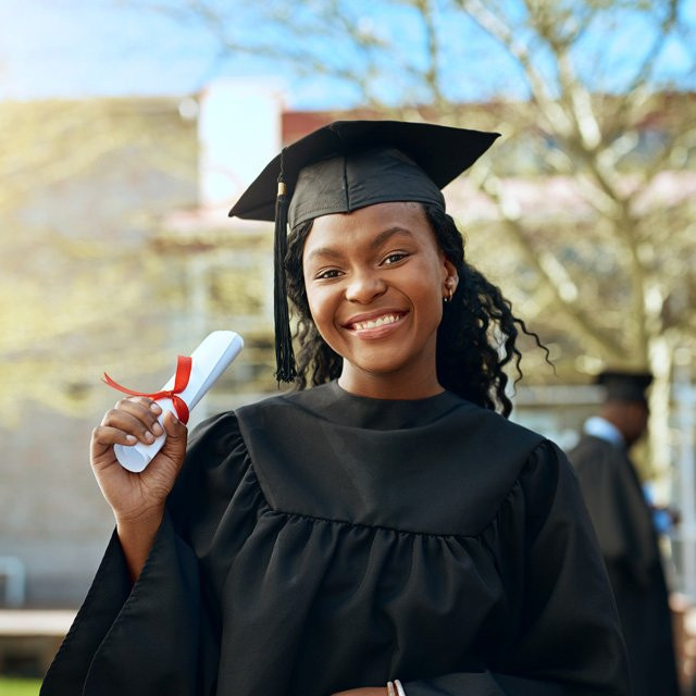 Graduate in cap and gown